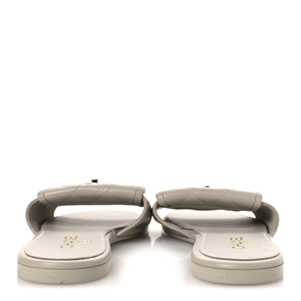 Lambskin Quilted Turnlock Flat Mules 39.5 Light Gray