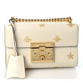 Grained Calfskin Bee Star Small Padlock Shoulder Bag White