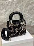 Lady Dior small black silk embroidery bag with silver hardware