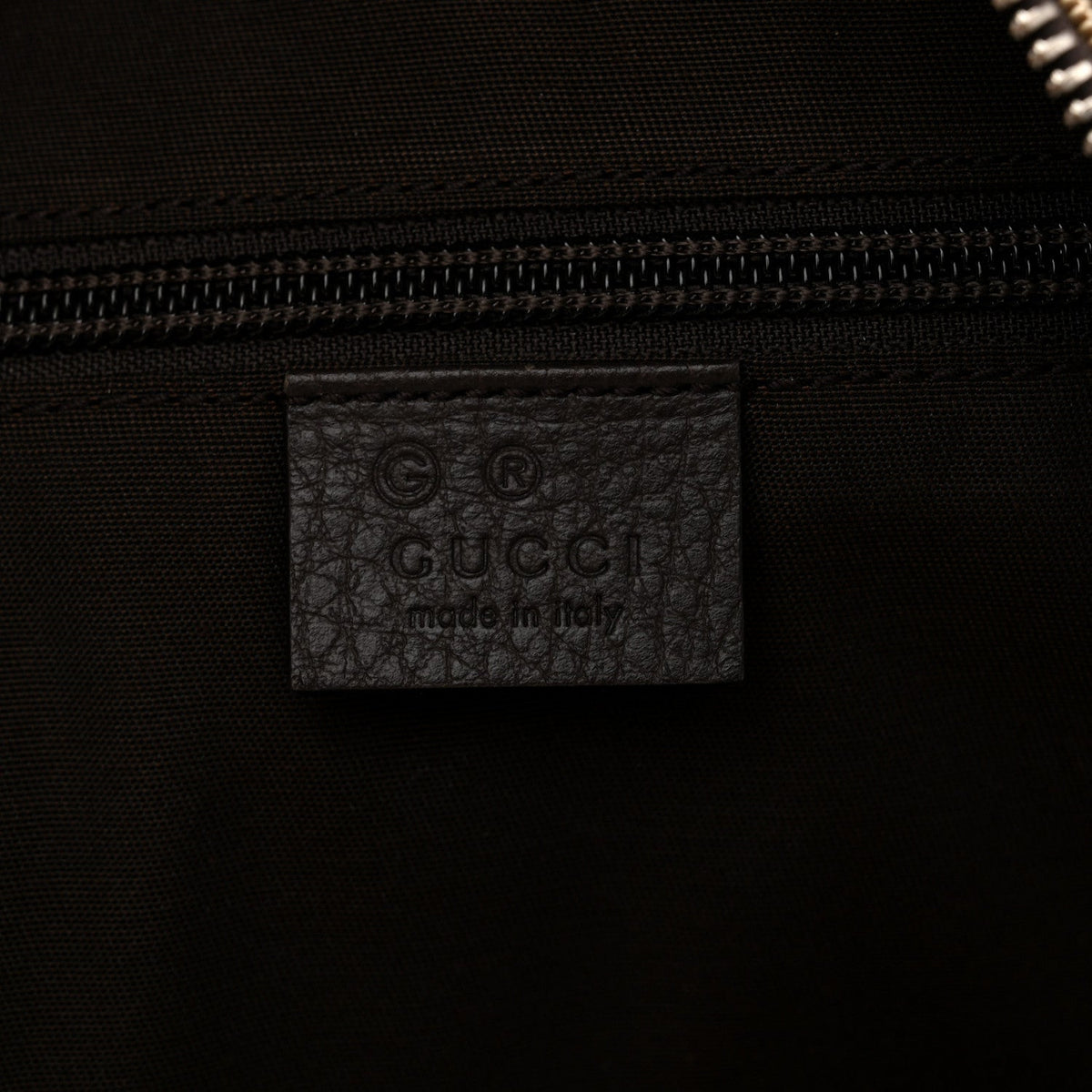 Monogram Travel Backpack Dark Brown