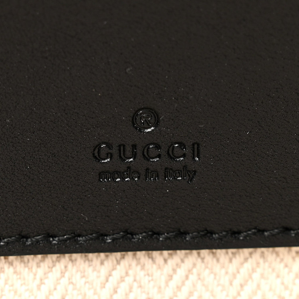 GG Supreme Monogram Textured Calfskin Emblem Mini Crossbody Black