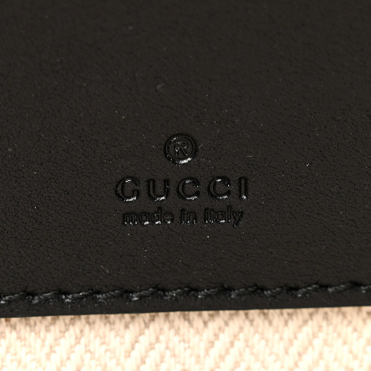 GG Supreme Monogram Textured Calfskin Emblem Mini Crossbody Black