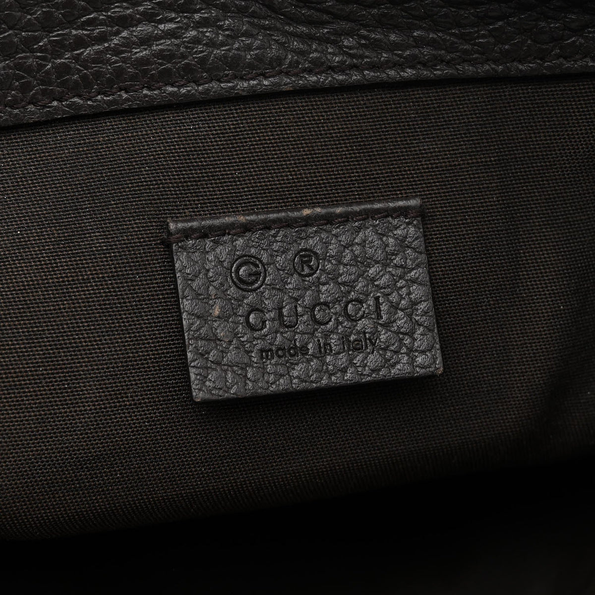Monogram Dollar Calfskin O Drawstring Backpack Beige Ebony Testa di Moro Dark Chocolate